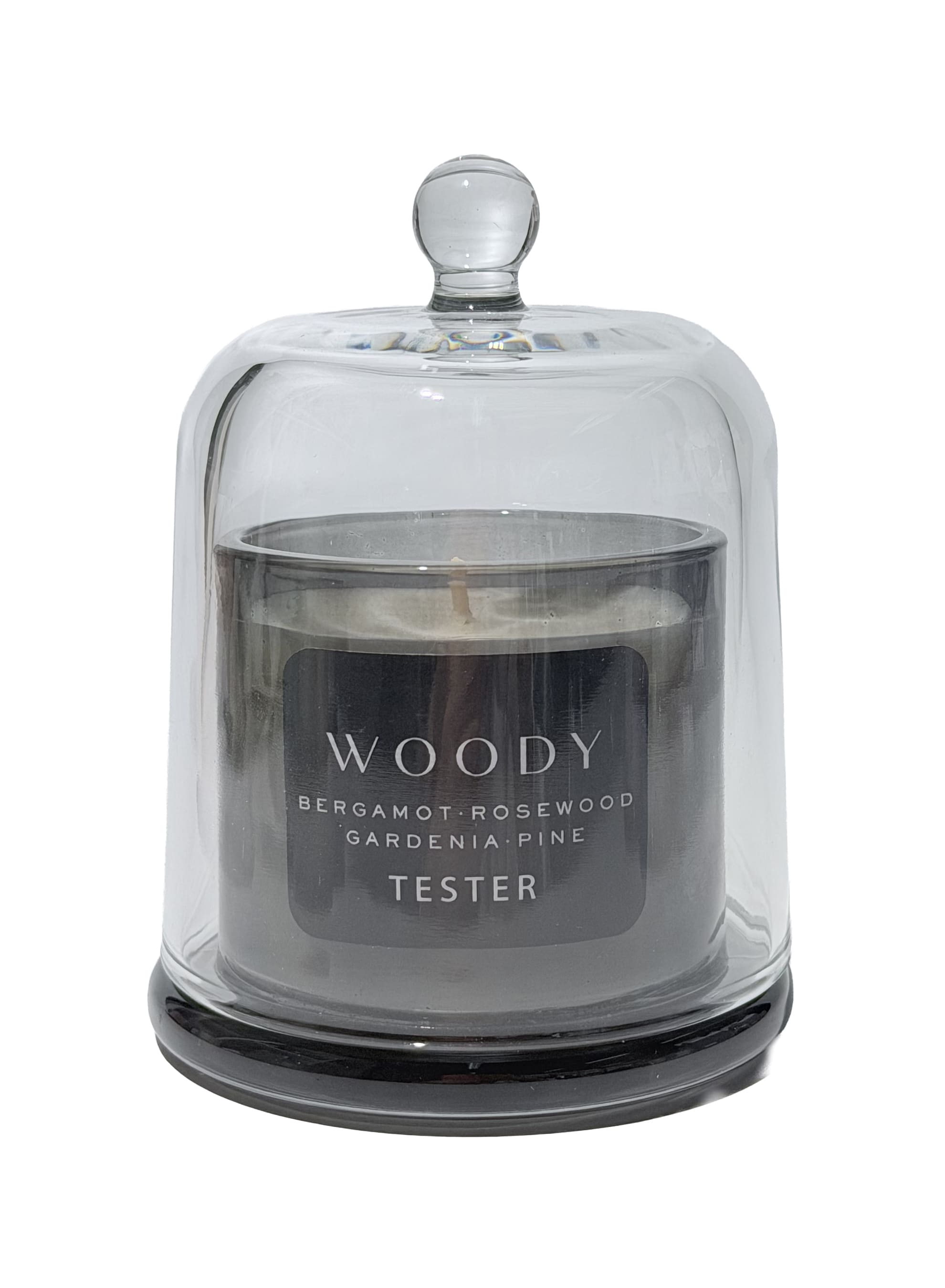 Caspiance - TESTER "Woody" Duftkerze im Glasflakon
Kopfnote: Bergamotte, Orange