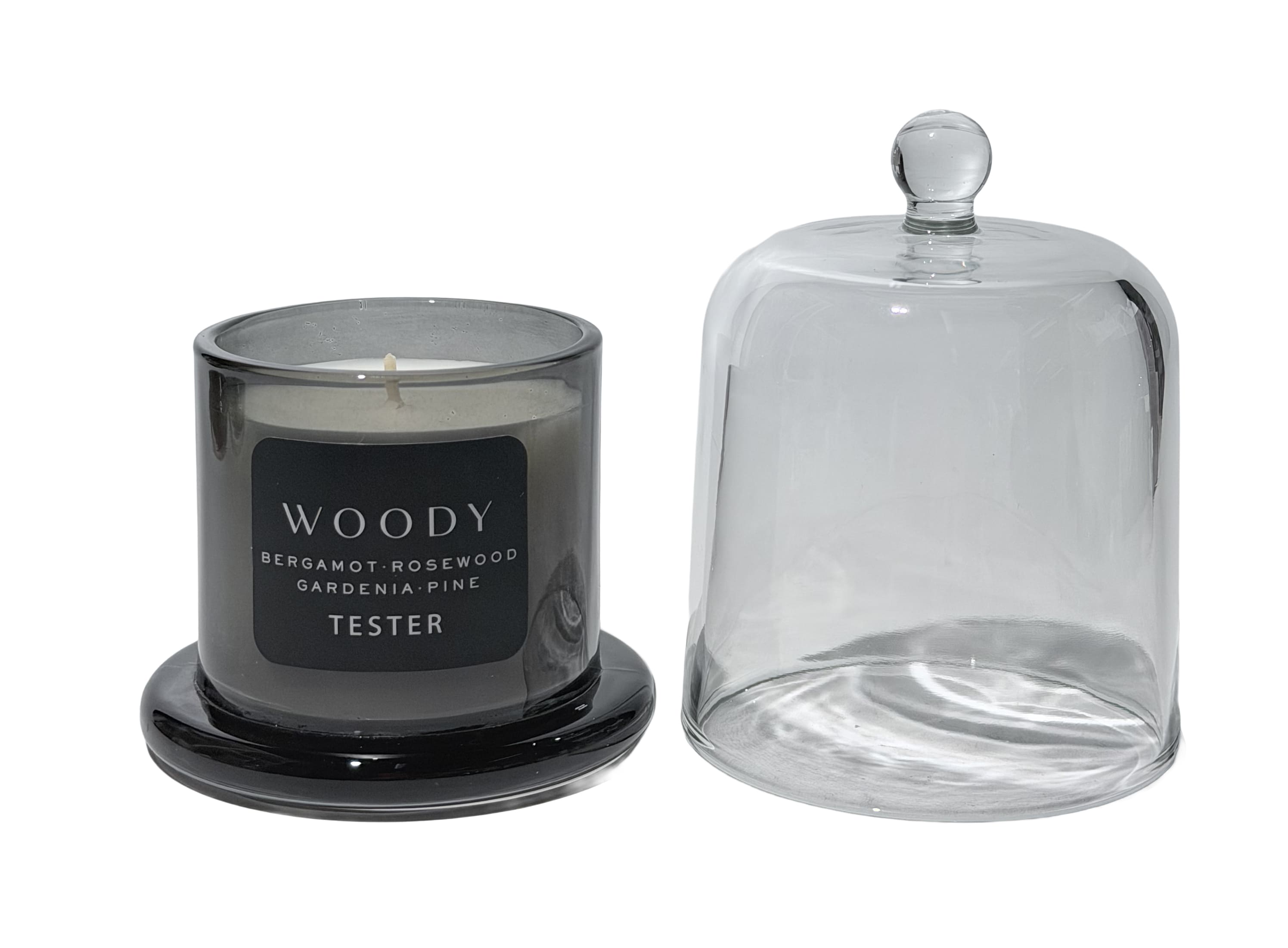 Caspiance - TESTER "Woody" Duftkerze im Glasflakon
Kopfnote: Bergamotte, Orange